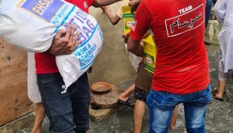 Rations being distributed in the floods